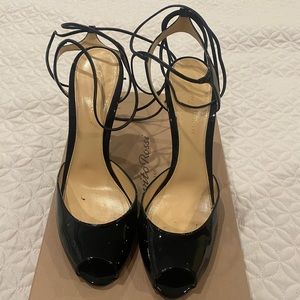 Ankle strap patent leather shoes